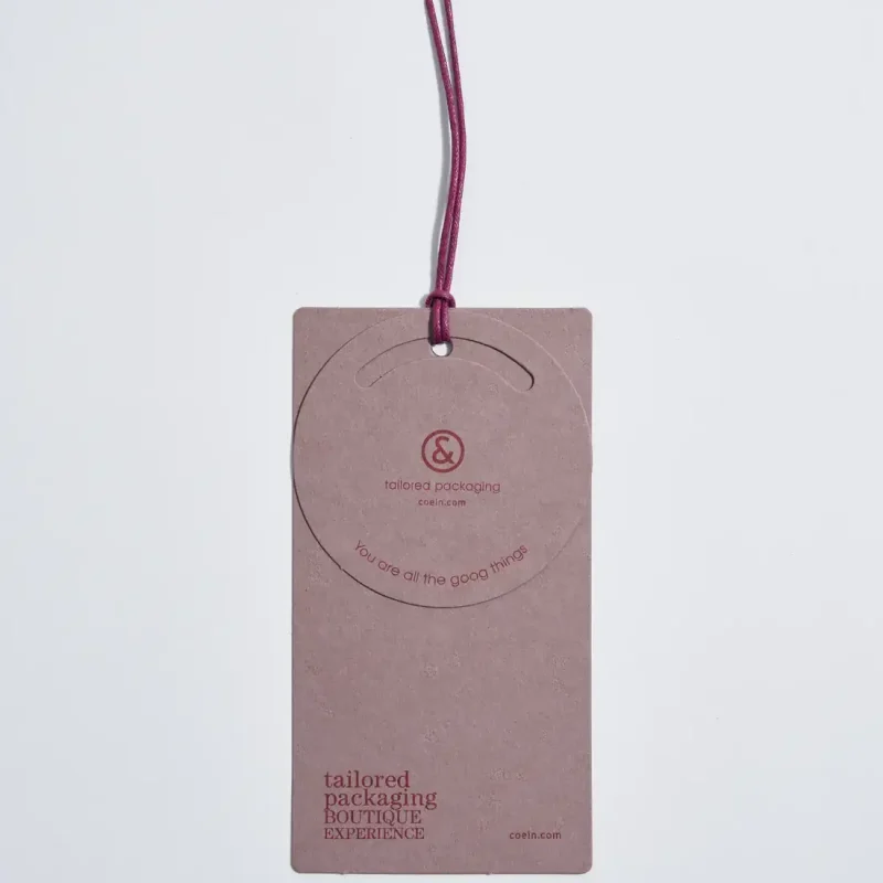 cartellino-assemblato-e-fustellato-su-carta-colorata